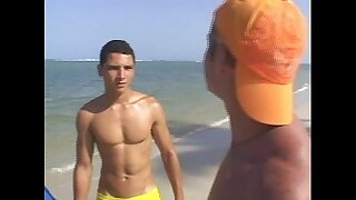 Hot gay threesome fucking on the littoral